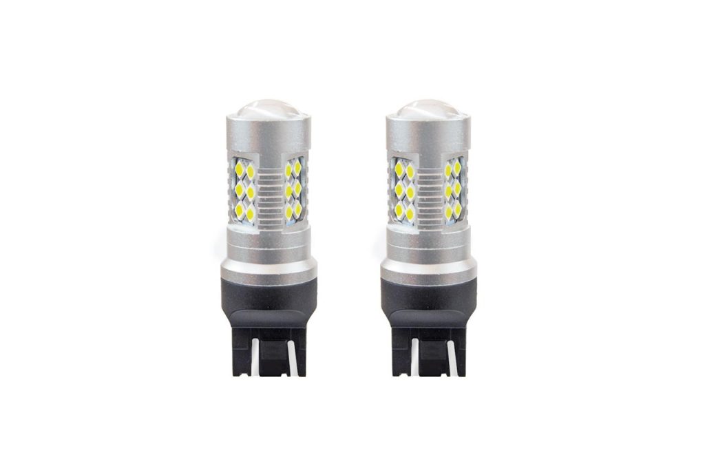 Εικόνα 1 από 1 — Amio – Λαμπτήρες LED τύπου W21/5W (T20 / 7443) για 12V & 24V ισχύος 6.2W με ψυχρό λευκό φως 5600K και 24 SMD 3030 CANBUS για αυξημένη ορατότητα πίσω φωτισμού – 1 Σετ (02126/AM)