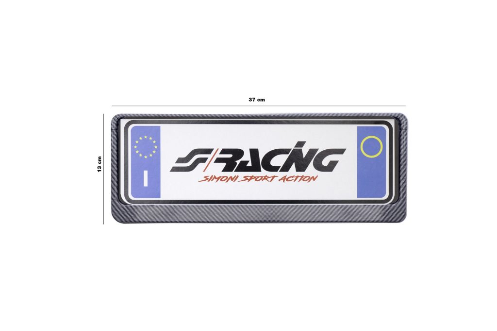 Εικόνα 2 από 2 — ΠΛΑΙΣΙΟ ΠΙΝΑΚΙΔΑΣ CARBON LOOK ΕΜΠΡΟΣ​ SIMONI RACING 37 x 13 cm – 1 TEM.
